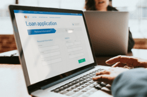 applying loan online through laptop