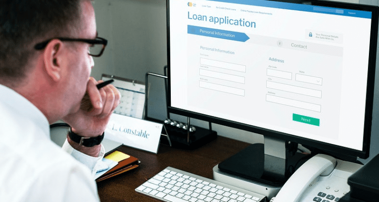 business man applying for loan online